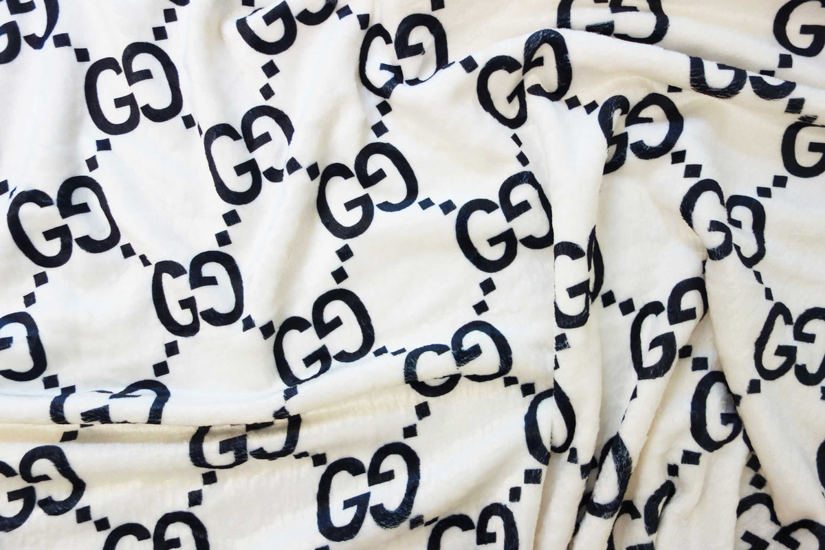Black Gucci monogram print on white cotton fabric – logofabrics