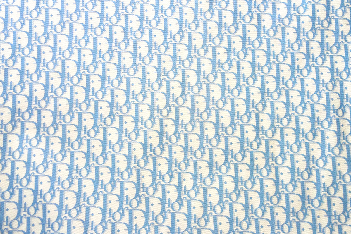 Blue CD monogram print on cotton fabric – logofabrics