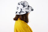 Bucket Hat with black monogram print made from Faux Fur fabric
