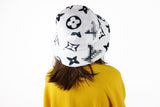 Bucket Hat with black monogram print made from Faux Fur fabric