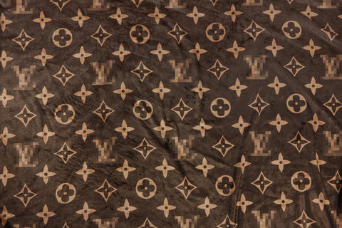 Cozy dark brown plush fabric with a monogram print
