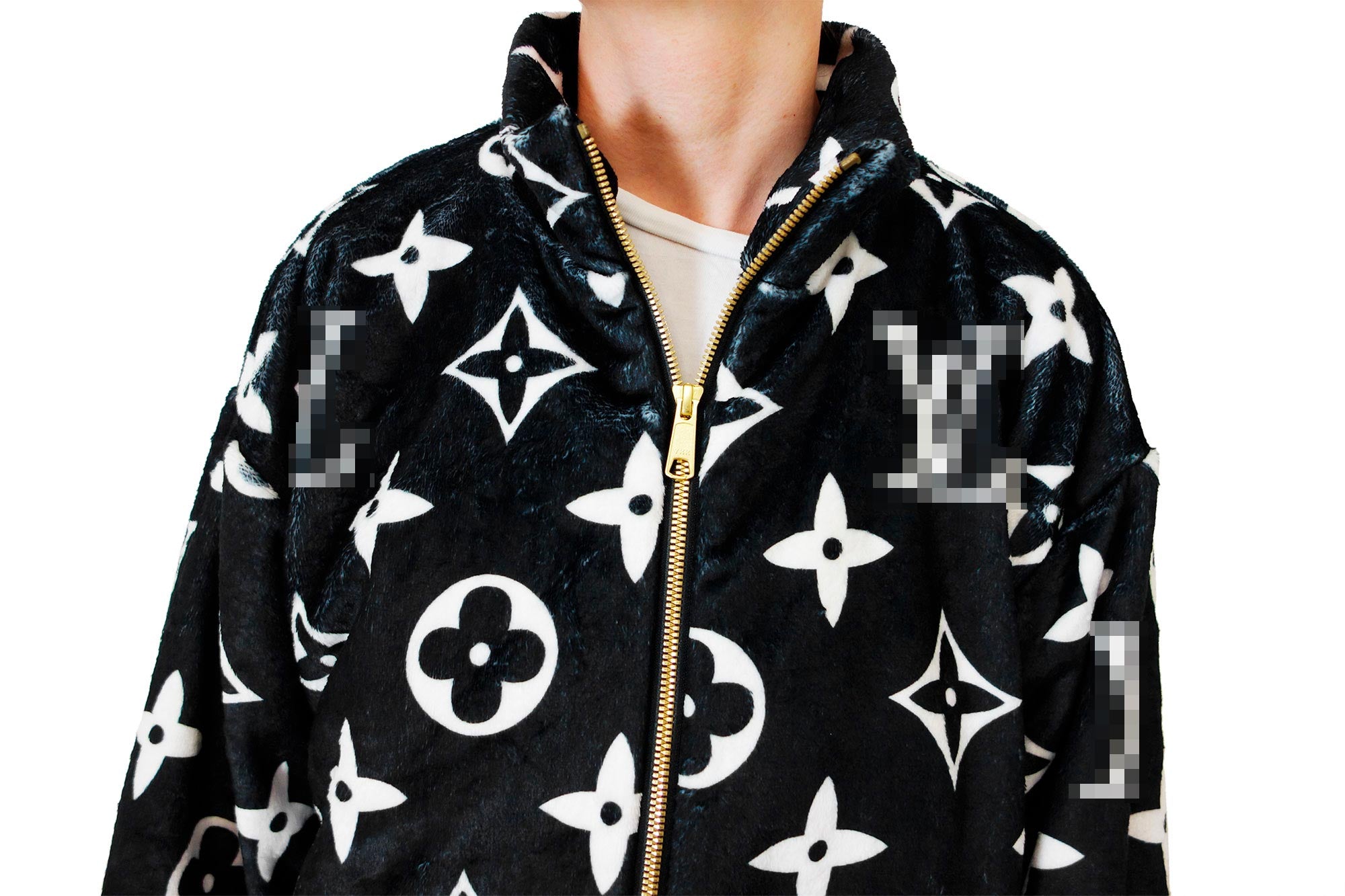 Cozy black faux fur zipper jacket with a white monogram print