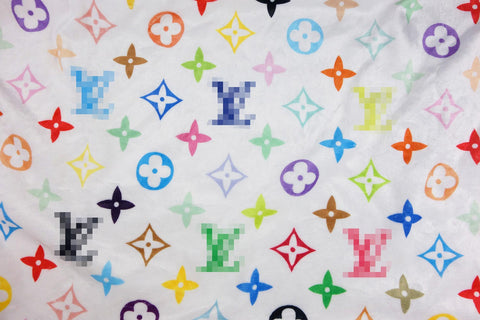 Cozy plush fabric with a multicolor monogram print