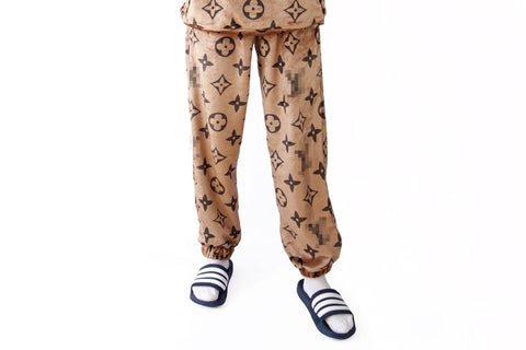 Cozy Brown faux fur Pants with a monogram print