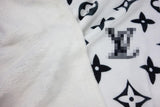 Cozy plush fabric with a Blacka Monogram print