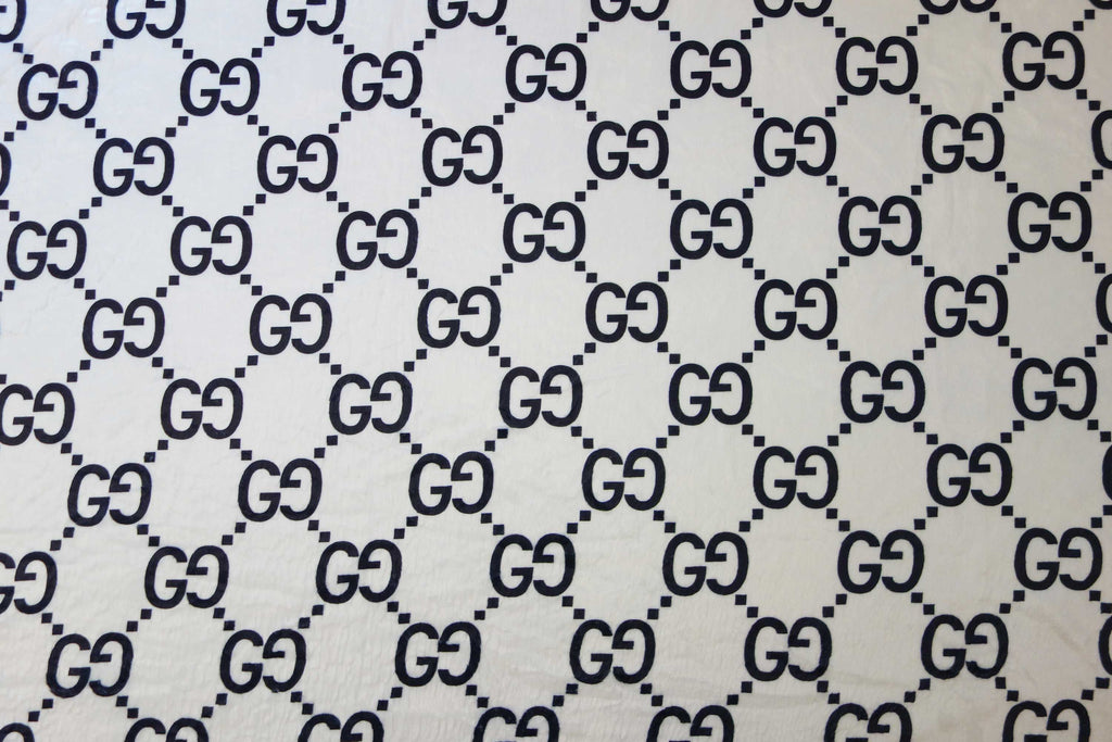 Black Gucci monogram print on white cotton fabric – logofabrics
