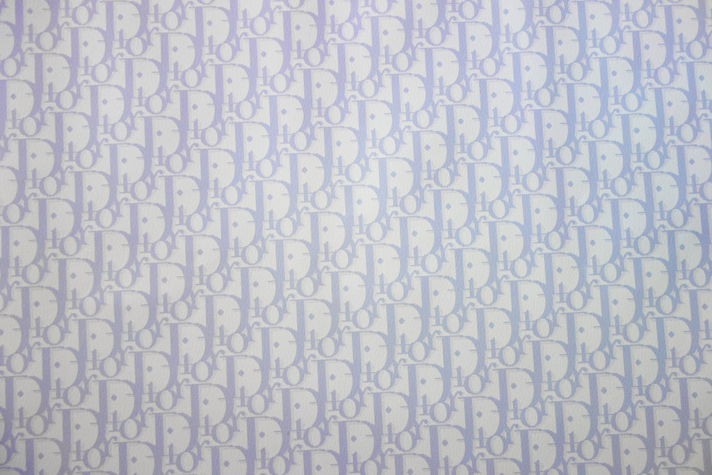White synthetic leather with baby blue CD monogram print – logofabrics