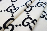 Cozy faux fur Wellsoft fabric with GG Inspired Black Monogram print