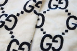 Cozy faux fur Wellsoft fabric with GG Inspired Black Monogram print