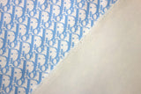 Blue CD monogram print on cotton fabric