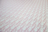 White synthetic leather with baby pink CD monogram print