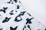 Cozy white faux fur Pants with black monogram print